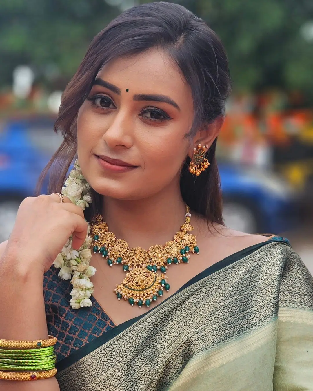 Deepa Jagadeesh Wearing Beautiful Earrings Jewellery Green Saree